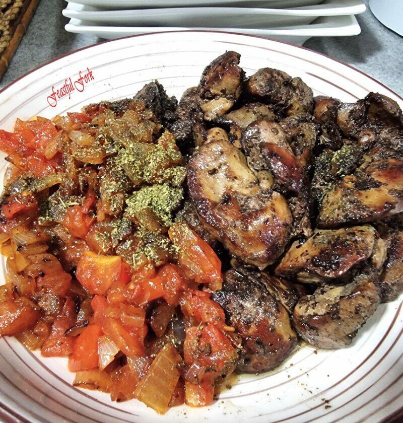 Chicken livers with onions and tomatoes