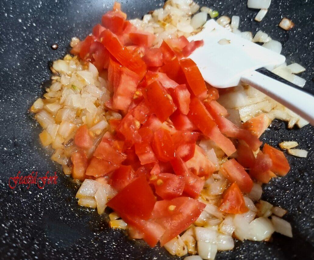 Ingredients for sauteed chicken livers and onions and tomatoes