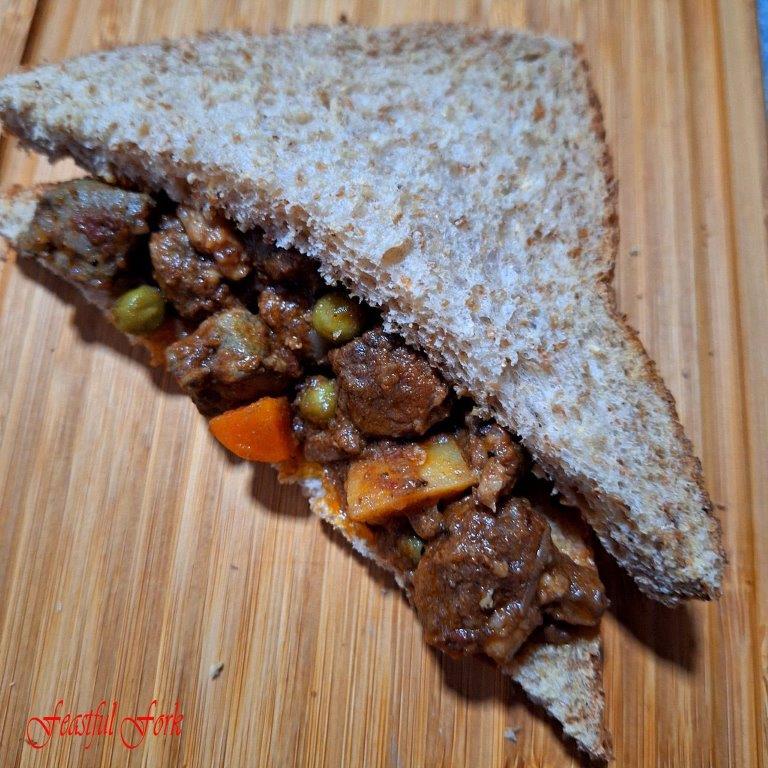 Beef menudo sandwiched in brown bread