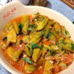 Okra and fresh tomatoes on a plate