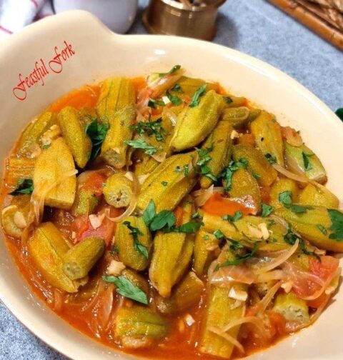 Okra and fresh tomatoes on a plate