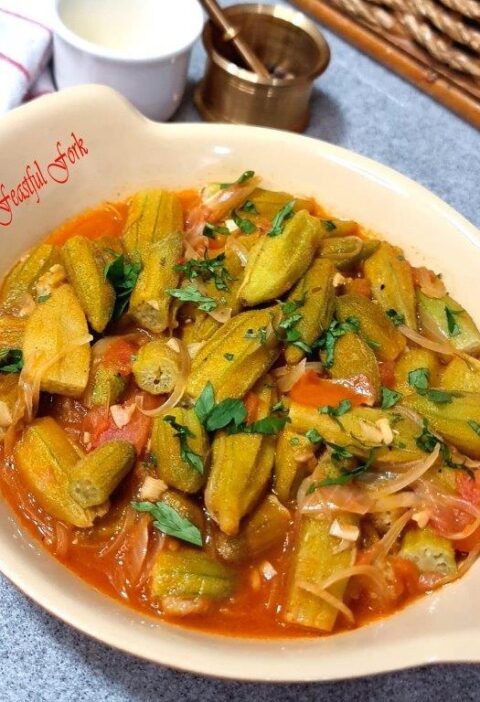 Okra and fresh tomatoes on a plate