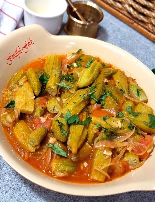 Okra and fresh tomatoes on a plate